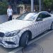 В Краснодаре оштрафовали водителя покрытого долларами Mercedes